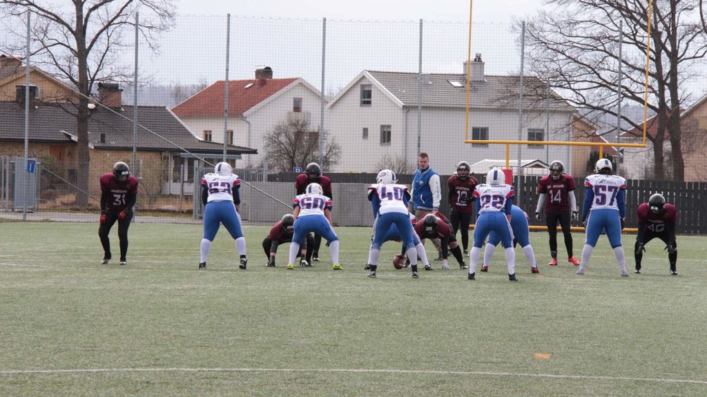 American football players lined up ready to wp