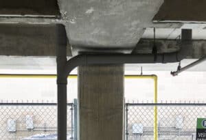 wp parking garages conduit installation on concrete pillar